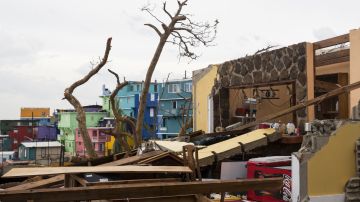 Damaged homes in the La Perla neighborhood the day after Hurricane Maria made landfall on September 21, 2017 in San Juan, Puerto Rico. Photo by Alex Wroblewski/Getty Images