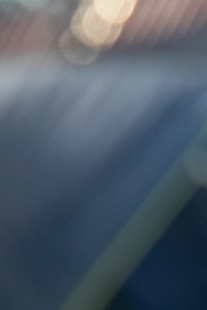 A mother sits as children take part in class at "The Sidewalk School" for immigrant children at a camp for asylum seekers on December 08, 2019 in the Mexican border town of Matamoros, Mexico. Photo by John Moore/Getty Images