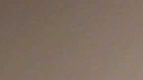 Visitors to the opening day of Art Basel look at a work  by Evan Penny titled, "female stretch variation # 2 " at the Miami Convention Center on December 5, 2013 in Miami Beach, Florida. Photo by Joe Raedle/Getty Images