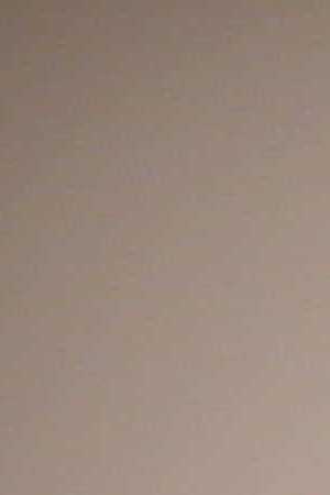 Visitors to the opening day of Art Basel look at a work  by Evan Penny titled, "female stretch variation # 2 " at the Miami Convention Center on December 5, 2013 in Miami Beach, Florida. Photo by Joe Raedle/Getty Images