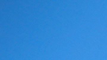 People from a caravan of Central American immigrants wait to ride on a truck, whose driver offered a ride, on their way toward the United States, on January 22, 2019 in Santo Domingo Zanatepec, Mexico. Photo by Mario Tama/Getty Images