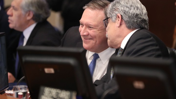U.S. Secretary of State Mike Pompeo talks with Carlos Alberto Calles Castillo, Chair of the Permanent Council, during a meeting of the Council of the Organization of American States (OAS), on January 24, 2019 in Washington, DC. Photo by Mark Wilson/Getty Images