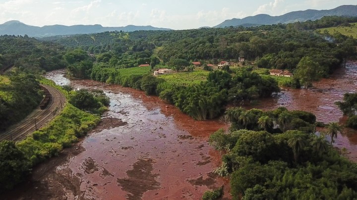 Aerial view of mudslides area a day after the collapse of a dam at an iron-ore mine belonging to Brazil's giant mining company Vale on January 26, 2019 in Corrego do Feijao near the town of Brumadinho. Photo by Pedro Vilela/Getty Images