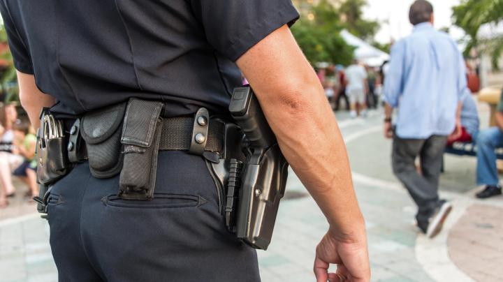 Law enforcement officer watching the streets.