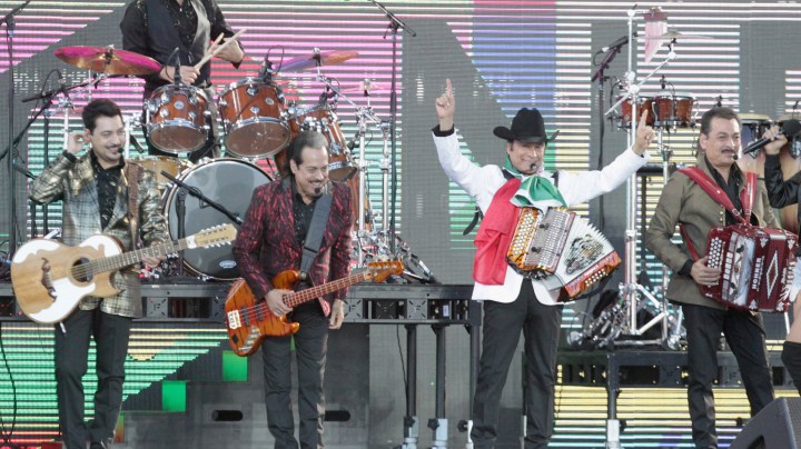 Los Tigres del Norte performs onstage at Univision and Fusion host RiseUp AS ONE at Cross Border Xpress. Photo by Leon Bennett/Getty Images for Univision