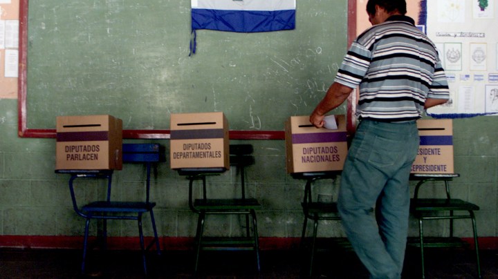 A voter casts her ballot at a polling station November 4, 2001 in Managua, Nicaragua. Photo by Max Trujillo/Getty Images