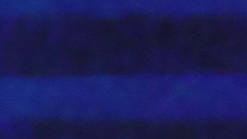 Former housing secretary Julian Castro, Sen. Cory Booker (D-NJ) and Sen. Elizabeth Warren (D-MA) react during the first night of the Democratic presidential debate on June 26, 2019 in Miami, Florida.  Photo by Raedle/Getty Images