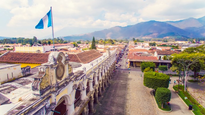 Elevated view of Antigua, Guatemala at twilight. 
Photo by Kryssia Campos / Getty Images