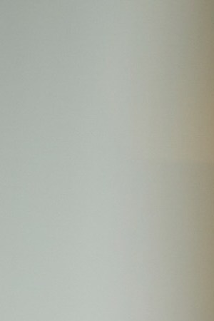 Woman writing in a book while studying at a table. Maskot / Getty Images