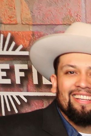Director Marvin Bryan Lemus, J.J. Soria, Karrie Martin, America Ferrera, writer Linda Yvette Chavez, Annie Gonzalez, producers Monica Macer and Charles D. King attend the premiere of Netflix's 'Gentefied.' Photo by Leon Bennett/Getty Images for Netflix.