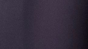 Friends sharing popcorn in theater. Getty Images