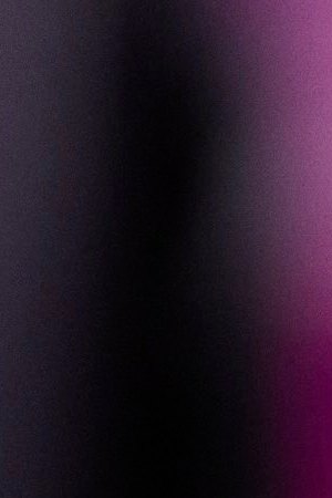 Friends sharing popcorn in theater. Getty Images