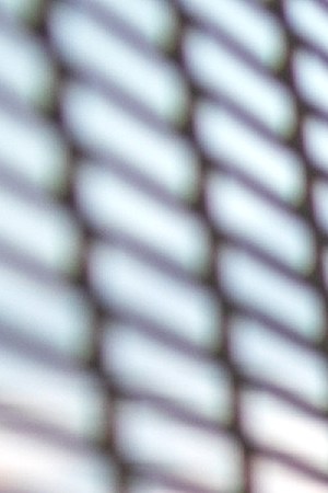 A U.S. Customs and Border Protection officer checks immigration documents as a Honduran asylum seeker arrives to the international bridge from Mexico to the United States on December 09, 2019 next to the border town of Matamoros, Mexico. Photo by John Moore/Getty Images
