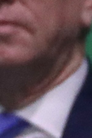 Singer Shakira (L) and her husband and footballer Gerard Pique of FC Barcelona (R) react in the stands as they watch the singles final match between Rafael Nadal of Spain and Denis Shapovalov of Canada during Day Seven of the 2019 Davis Cup at La Caja Magica on November 24, 2019 in Madrid, Spain. Photo by Alex Pantling/Getty Images