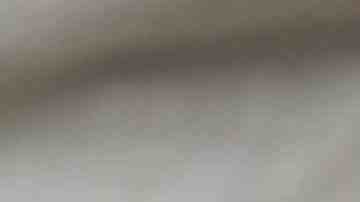 A man, identified only as Tomas, holds hands with his daughter, Yessica, 13, as they are cared for in an Annunciation House facility after they were reunited on July 24, 2018 in El Paso, Texas. Tomas and Photo by Joe Raedle/Getty Images