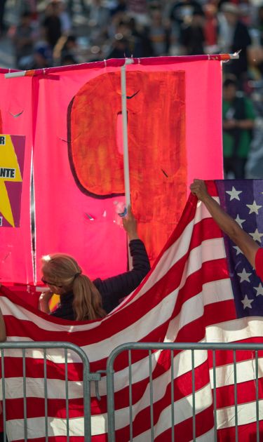 People march and rally on May Day, also known as International Workers Day, on May 1, 2019 in Los Angeles, California. They were calling for support of labor and immigrant concerns such as wage improvement, immigration reform and a citizenship question in the upcoming national census. Photo by David McNew/Getty Images