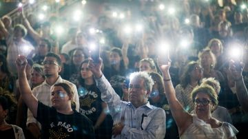 People attend a community memorial service honoring victims of the mass shooting earlier this month which left 22 people dead and 24 more injured, at Southwest University Park on August 14, 2019 in El Paso, Texas. Photo by Sandy Huffaker/Getty Images
