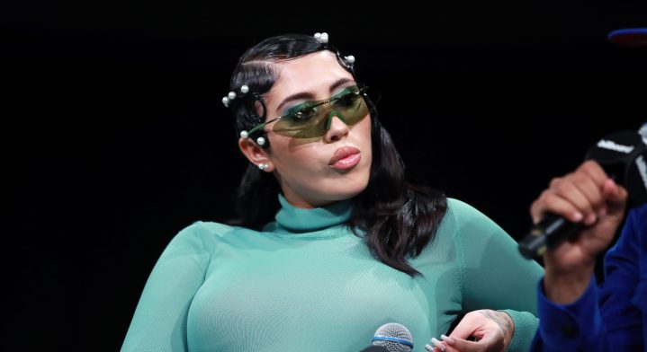 Kali Uchis and Myke Towers speak onstage during The Summit presented by Billboard at NeueHouse Hollywood on October 15, 2019 in Los Angeles, California. Photo by Rich Fury/Getty Images