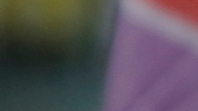 A demonstrator holds a sign that reads "Femicide state" during a national strike on November 25, 2019 in Santiago, Chile. Photo by Marcelo Hernandez/Getty Images