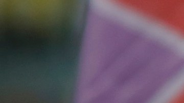 A demonstrator holds a sign that reads "Femicide state" during a national strike on November 25, 2019 in Santiago, Chile. Photo by Marcelo Hernandez/Getty Images