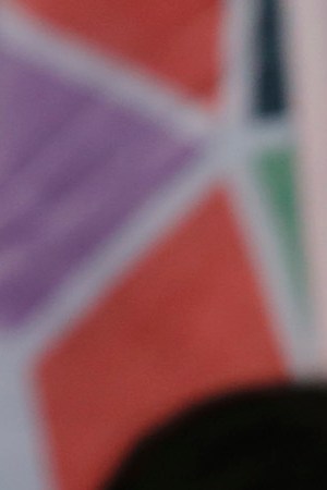 A demonstrator holds a sign that reads "Femicide state" during a national strike on November 25, 2019 in Santiago, Chile. Photo by Marcelo Hernandez/Getty Images