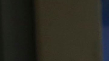 A commuter waits for the bus during the coronavirus pandemic on March 20, 2020 in Santiago, Chile. Photo by Marcelo Hernandez/Getty Images