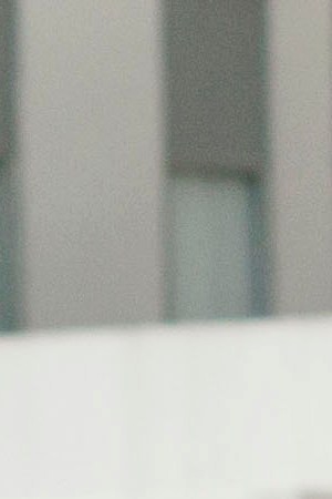 A worker using a mask and a work suit cleans near the mobile emergency unit donated by the Red Cross to Guayaquil at the IESS hospital in Los Ceibos on April 7, 2020 in Guayaquil, Ecuador. Photo by Eduardo Maquilón/Getty Images