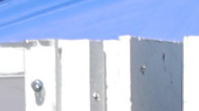 A woman is tested for COVID-19 by a member of the Los Angeles Fire Department wearing personal protective equipment (PPE) in Skid Row amidst the coronavirus pandemic on April 21, 2020 in Los Angeles, California. Photo by Mario Tama/Getty Images