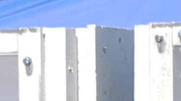 A woman is tested for COVID-19 by a member of the Los Angeles Fire Department wearing personal protective equipment (PPE) in Skid Row amidst the coronavirus pandemic on April 21, 2020 in Los Angeles, California. Photo by Mario Tama/Getty Images
