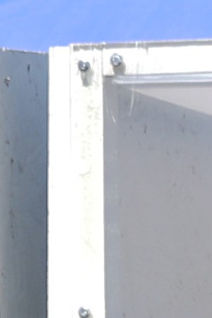 A woman is tested for COVID-19 by a member of the Los Angeles Fire Department wearing personal protective equipment (PPE) in Skid Row amidst the coronavirus pandemic on April 21, 2020 in Los Angeles, California. Photo by Mario Tama/Getty Images