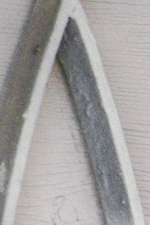 A woman wearing a face mask waits at the door of her house to receive food aid as Colombian military visit the impoverished slum at El Codito neighbourhood  handing out family food baskets during government-ordered obligatory quarantine on April 23, 2020 in Bogota, Colombia. Photo by Guillermo Legaria/Getty Images