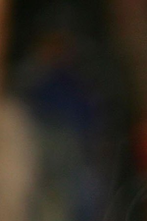 Smoke rises from an abalone shell containing burning copal that is traditionally used in Native American cleansing ceremonies and now is used by day laborers who continue their 3,000-mile, two-month run from Santa Monica, California to New York City to raise awareness of discrimination faced by immigrant day laborers and reportedly to call for citizenship for undocumented immigrants on March 6, 2006 in Pomona, California. Photo by David McNew/Getty Images