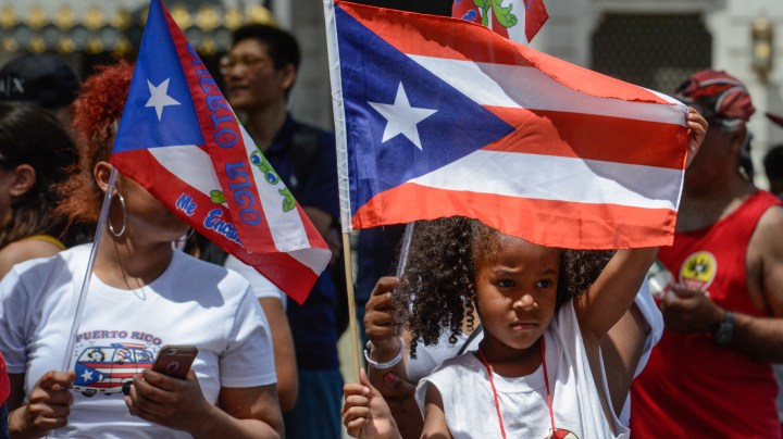 People participate in the annual Puerto Rican Day Parade marching up 5th Ave. on June 11, 2017 in New York City. Photo by Stephanie Keith/Getty Images