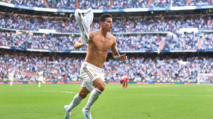 James Rodriguez of Real Madrid celebrates after scoring his team's 4th goal during the Liga match between Real Madrid CF and Granada CF at Estadio Santiago Bernabeu on October 05, 2019 in Madrid, Spain. Photo by Denis Doyle/Getty Images
