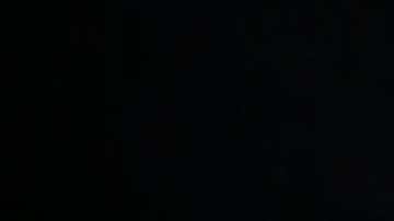 The temperature of a Bolivian child is measured in front of Bolivian embassy during a demonstration requesting repatriation on April 28, 2020 in Santiago, Chile. Photo by Marcelo Hernandez/Getty Images