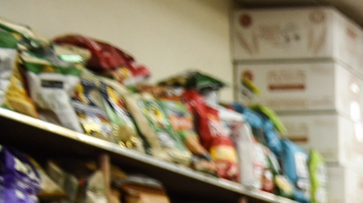 A bodega worker restocks produce on April 28, 2020 in the Brooklyn borough in New York City. Photo by Stephanie Keith/Getty Images
