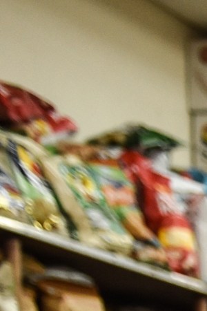 A bodega worker restocks produce on April 28, 2020 in the Brooklyn borough in New York City. Photo by Stephanie Keith/Getty Images