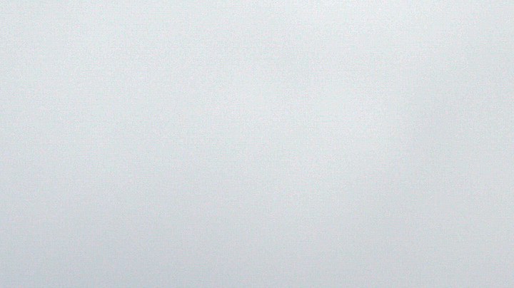 A Venezuelan migrant carrying a bag on his shoulders walks along the side of the highway out of the city on April 06, 2020 in Bogota, Colombia. Photo by Guillermo Legaria/Getty Images