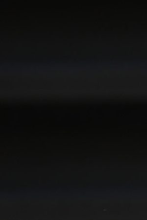 A resident waits in line to vote at a polling place at Riverside University High School on April 07, 2020 in Milwaukee, Wisconsin. Photo by Scott Olson/Getty Images