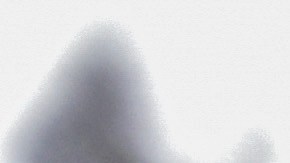 A woman holds her daughter while she waits to receive food aid as Colombian military visit the El Codito neighborhood handing out family food baskets during government-ordered obligatory quarantine on April 23, 2020 in Bogota, Colombia. Photo by Guillermo Legaria/Getty Images