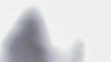 A woman holds her daughter while she waits to receive food aid as Colombian military visit the El Codito neighborhood handing out family food baskets during government-ordered obligatory quarantine on April 23, 2020 in Bogota, Colombia. Photo by Guillermo Legaria/Getty Images