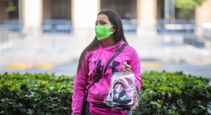 A street vendor sells face masks during health emergency to curb spread of COVID-19 on May 20, 2020 in Mexico City, Mexico. Photo by Hector Vivas/Getty Images