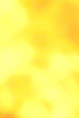 A man raises his fist in front of a burning building during protests sparked by the death of George Floyd while in police custody on May 29, 2020 in Minneapolis, Minnesota. Photo by Scott Olson/Getty Images