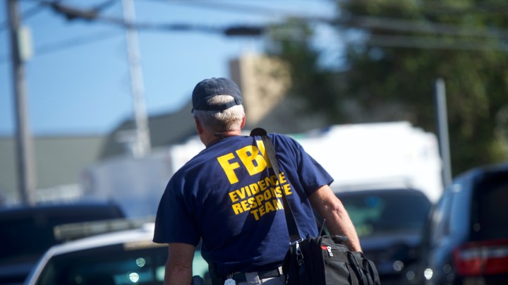 A FBI evidence response team agent arrives near the scene of an "pipe bomb-style device" explosion on September 17, 2016 in Seaside Park, New Jersey. Photo by Mark Makela/Getty Images