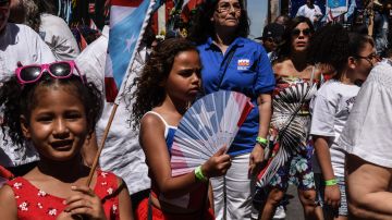 People participate in the annual Puerto Rican Day Parade marching up 5th Ave. on June 11, 2017 in New York City. Photo by Stephanie Keith/Getty Images