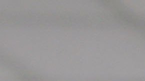 Marielys Krystel Dominguez Guerra from Panama looks through a microscope during a class while attending the Latin American School of Medical Sciences December 4, 2006 in Havana, Cuba. Photo by Joe Raedle/Getty Images