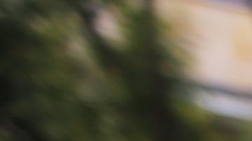 A young woman protesting holding a poster that says "Stop kiling us" in Bogotá, Colombia. Photo by Ana Luisa González.