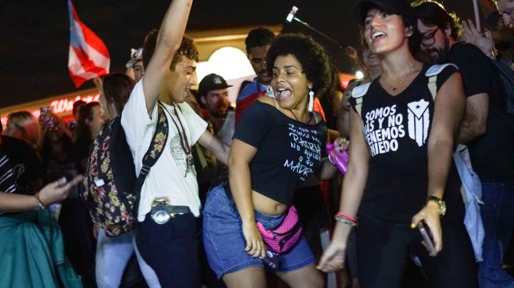 Protesters dance in the street during an anti-government demonstration in front of the Department of Justice on July 29, 2019 in San Juan, Puerto Rico. Photo by Angel Valentin/Getty Images