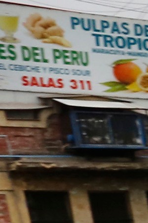 A worker walks while pulling a shopping cart with vegetables at Central Market on May 28, 2020 in Santiago, Chile. Photo by Marcelo Hernandez/Getty Images
