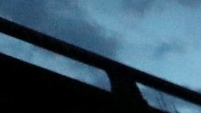 A demonstrator holds an American flag in front of California Highway Patrol officers during a protest sparked by the death of George Floyd while in police custody on May 29, 2020 in Oakland, California. Photo by Justin Sullivan/Getty Images